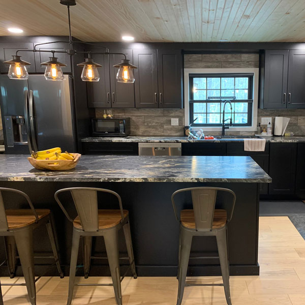 dark modern farmhouse kitchen with metal accents